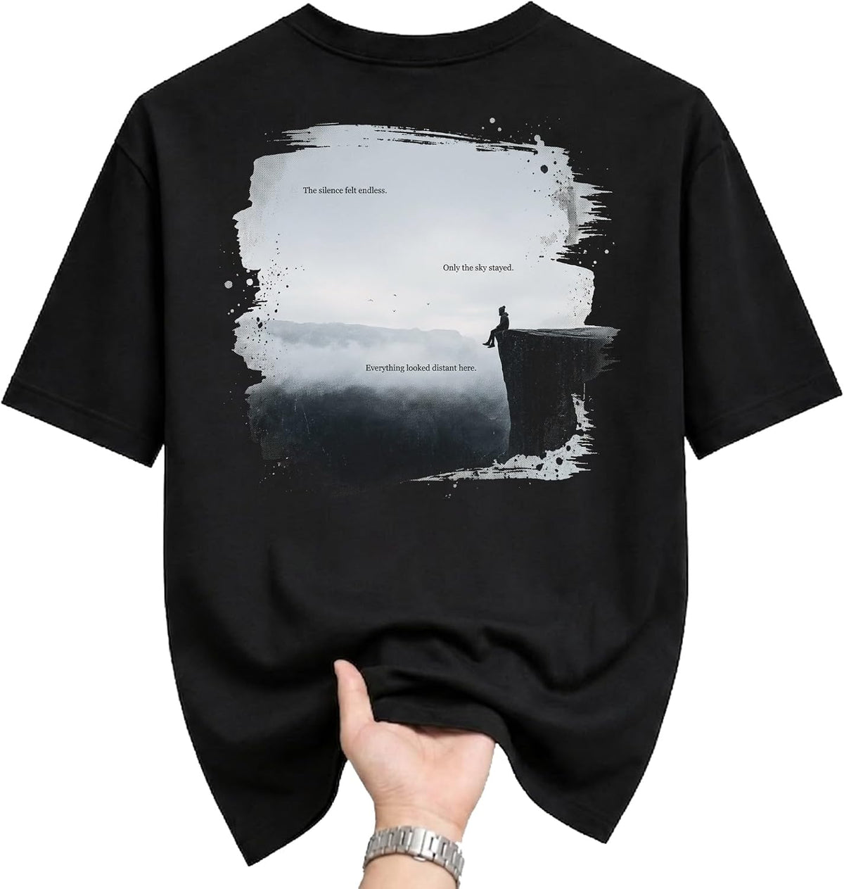 Graphic Tee Unisex Black T-Shirt with Aesthetic Print Featuring a Person Sitting on a Cliffside Silhouette